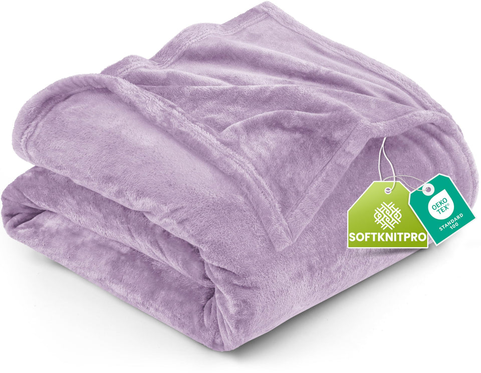 Utopia Bedding lilac fleece blanket on bed for cozy warmth.