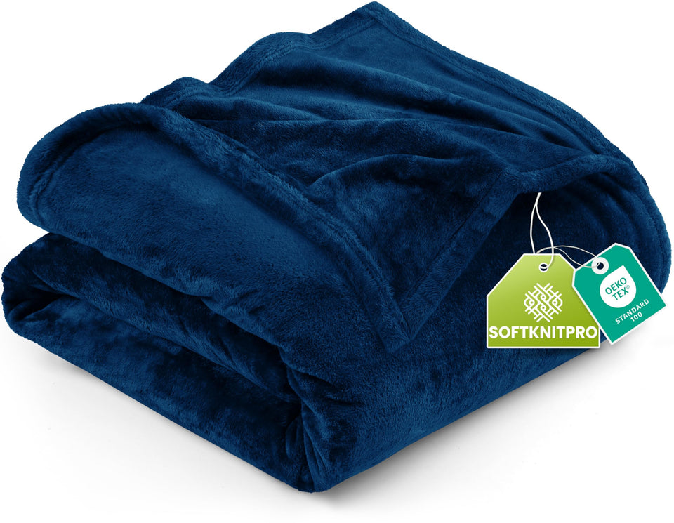 Utopia Bedding fleece blanket navy full size draped on bed for cozy warmth.
