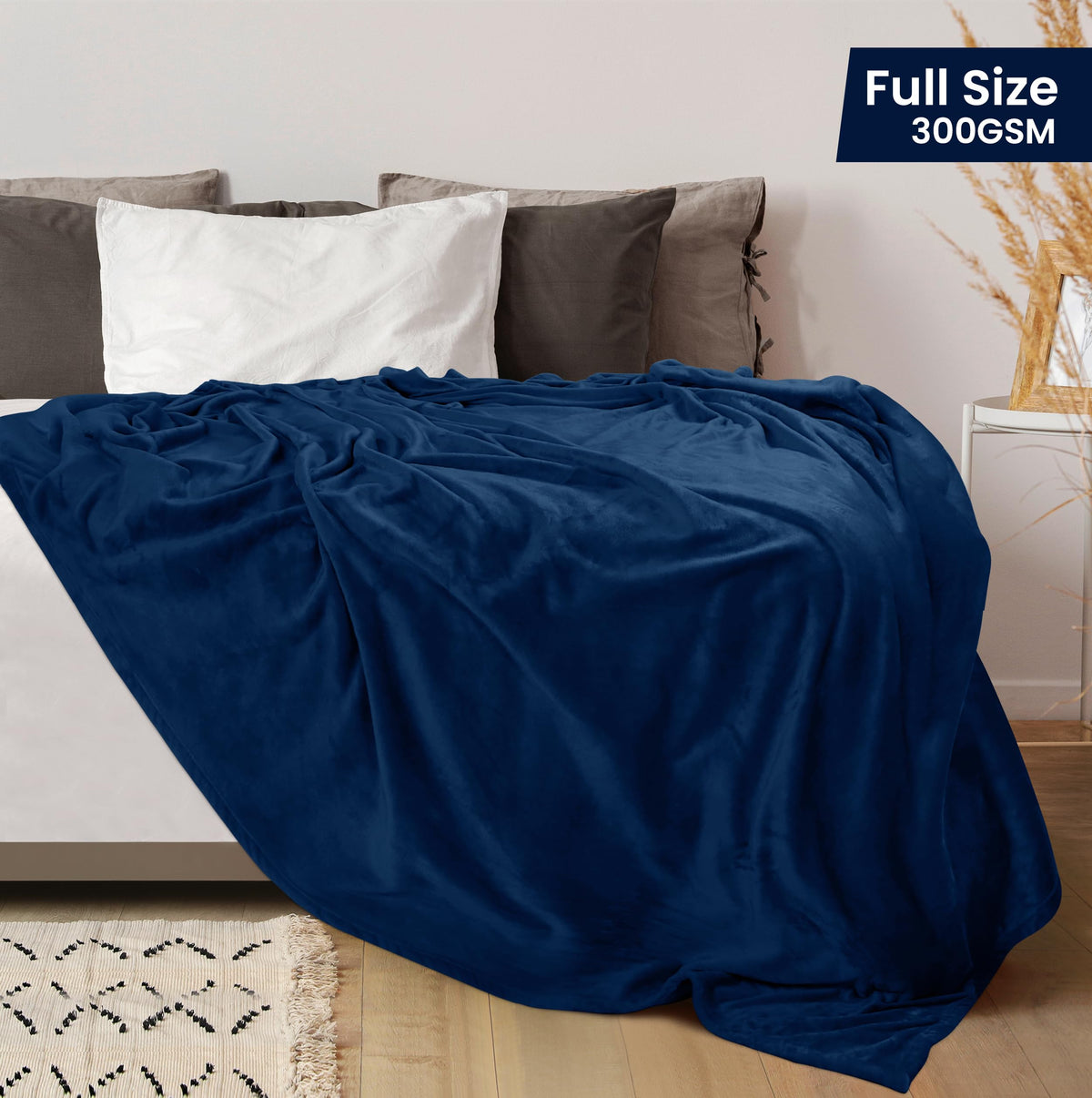 Utopia Bedding fleece blanket navy full size folded on bed adds luxurious style.