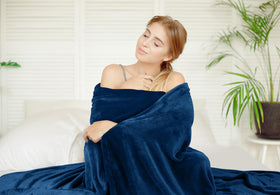 Utopia Bedding fleece blanket navy full size on sofa enhances movie night comfort.