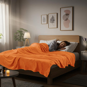 Utopia Bedding fleece blanket on living room couch for relaxed movie night.