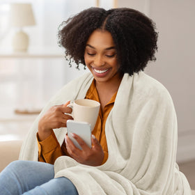 Folded blanket showing compact size for easy storage and travel