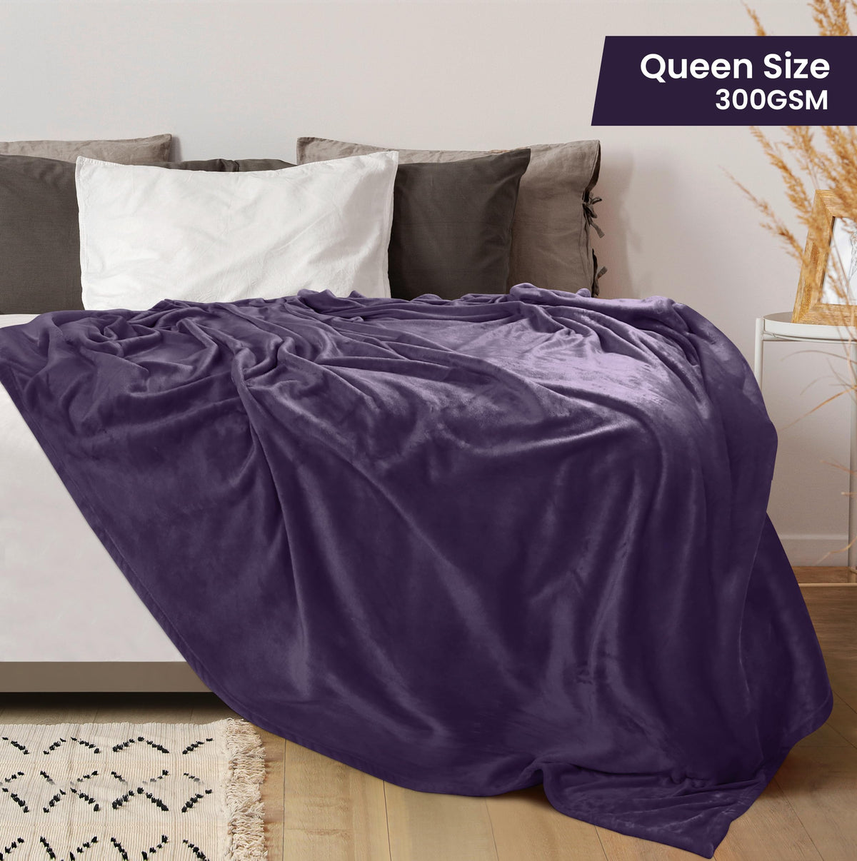 Utopia Bedding fleece blanket folded for coziness on sofa.