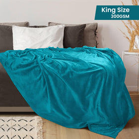 Utopia Bedding fleece blanket turquoise king-size draped over bed for cozy luxury.
