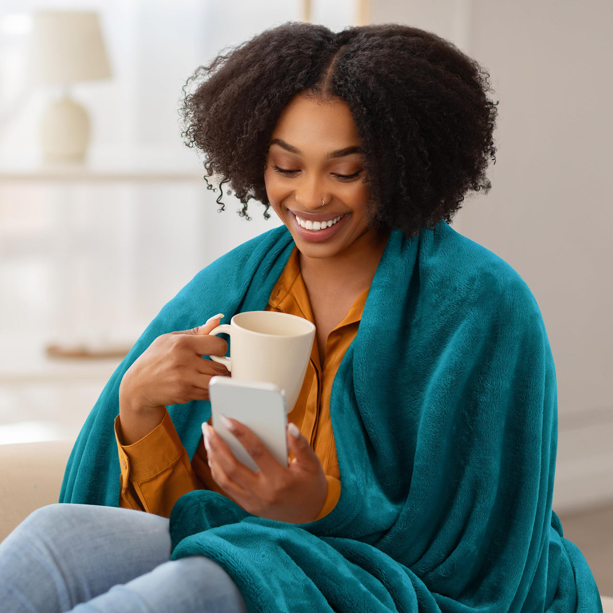 Utopia Bedding fleece blanket turquoise microfiber softness highlighted on a tidy bed.
