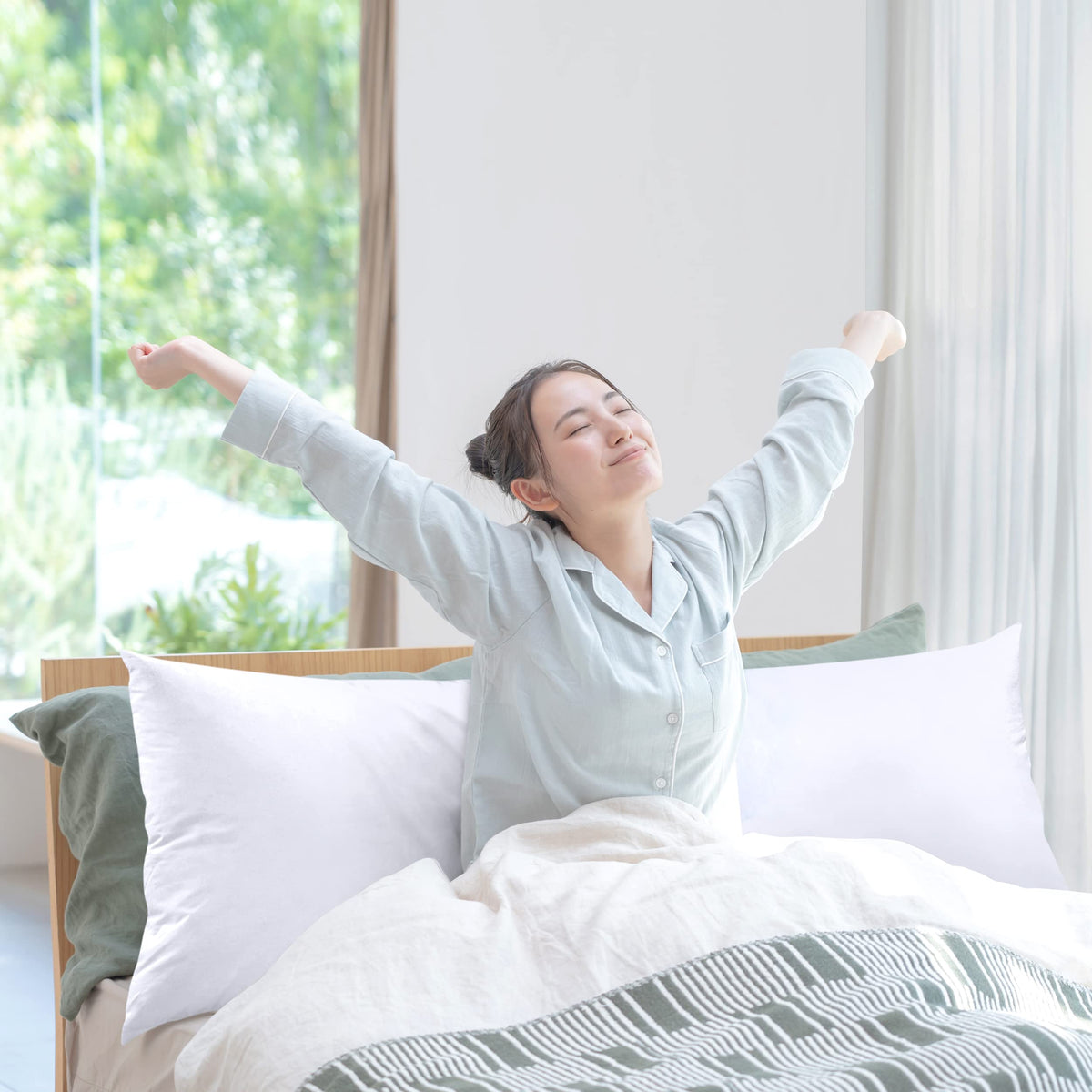Utopia Bedding bed setup shows versatile long pillow in cozy arrangement