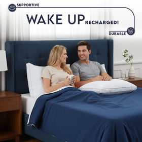 Pillows on a bed illustrating suitability for side sleepers with ample loft.