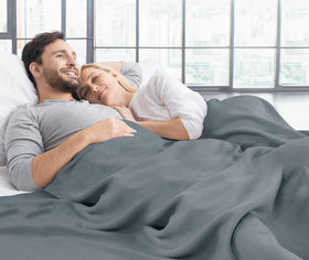 Utopia Bedding knit blanket on a couch for cozy movie nights.