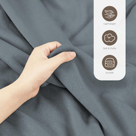Utopia Bedding knit blanket in a reading nook adds warmth and style.