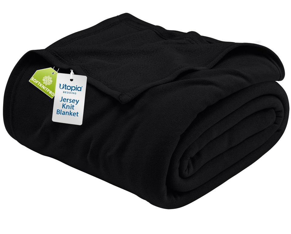 Utopia Bedding knit blanket queen black on bed, breathable warmth for cozy lounging