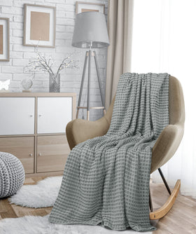 Utopia Bedding lightweight cotton blanket used for picnics and travel.