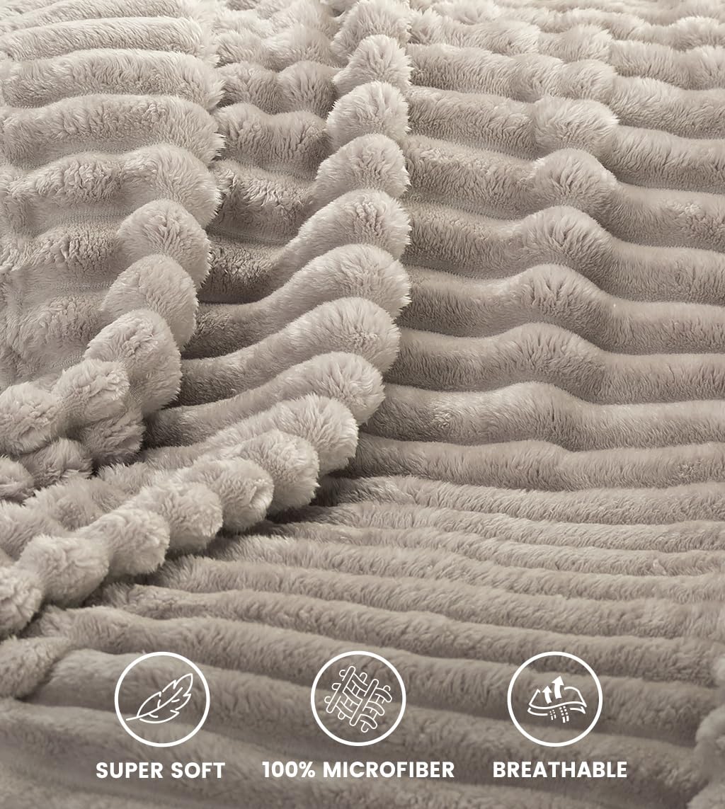 Utopia Bedding linen striped fleece blanket draped over a sofa illustrates cozy lounge comfort