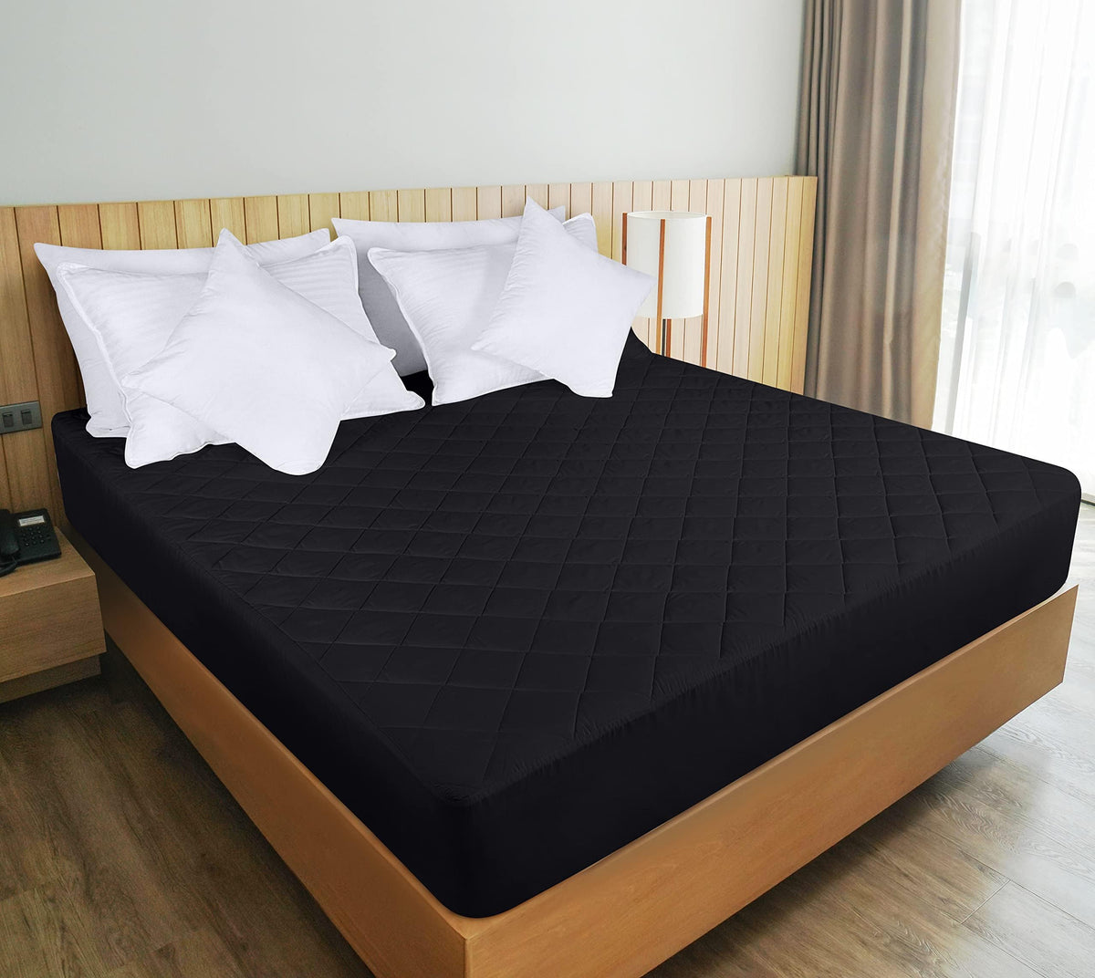 Utopia Bedding machine washable mattress pad for easy care.