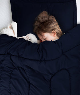 Utopia Bedding Navy kids room décor idea featuring playful prints and tidy look.