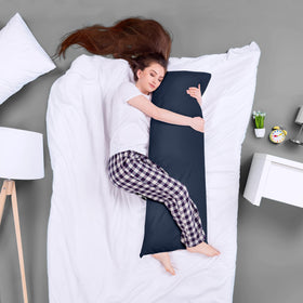 Nursing and maternity pillow use with contour-friendly design.