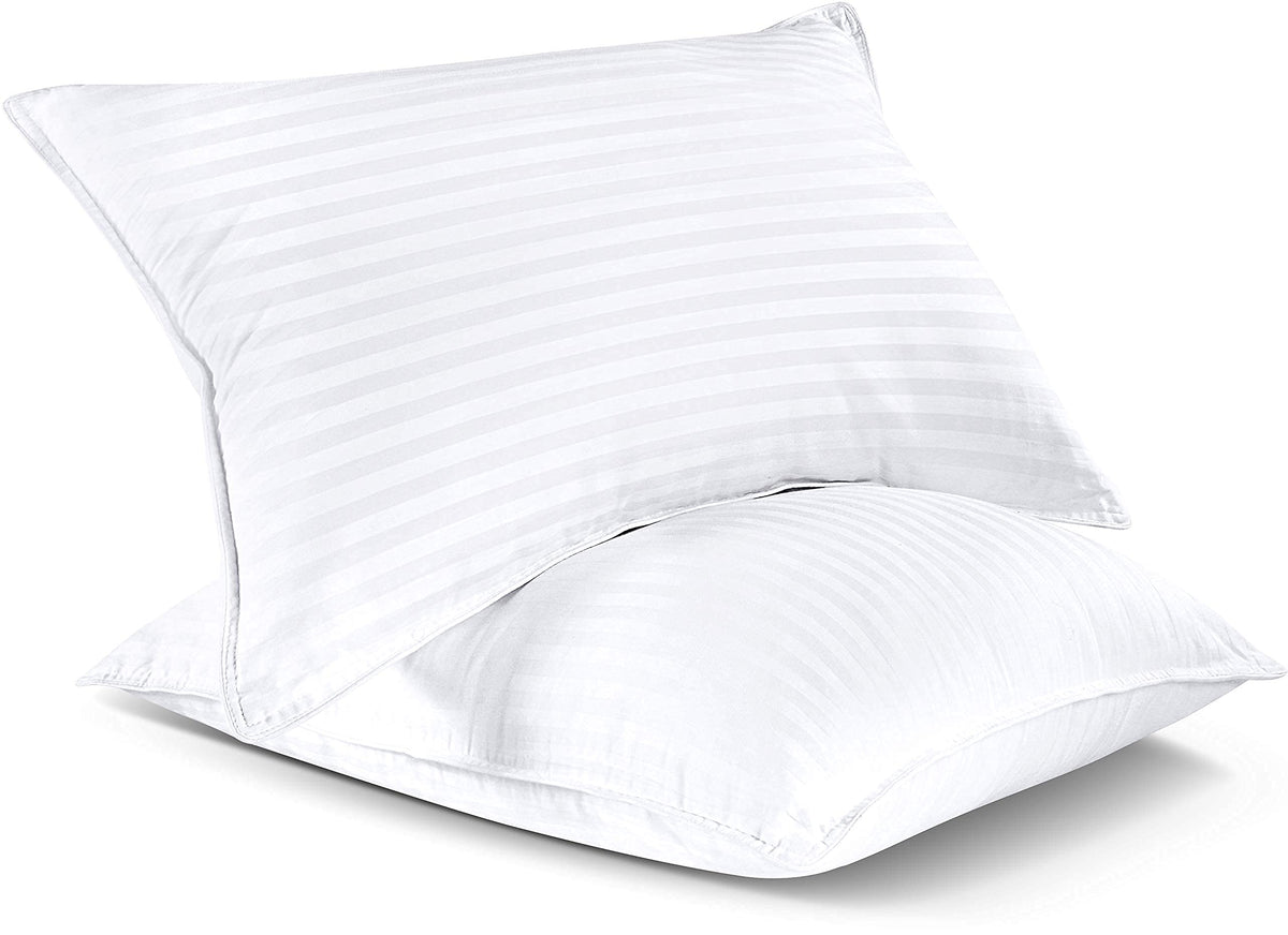 Pillows arranged for back, side, and stomach sleepers with a hint of loft.
