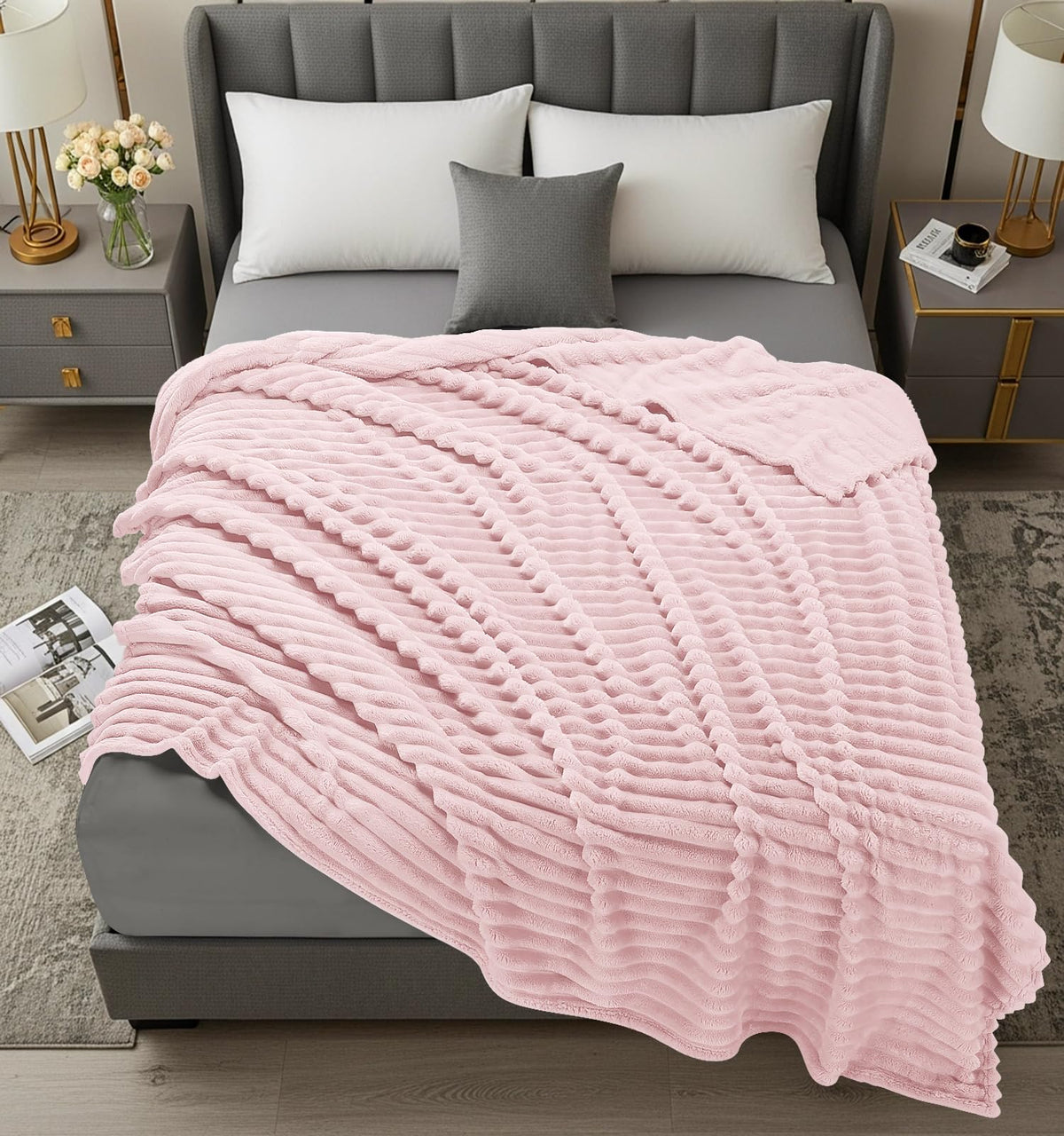 Utopia Bedding pink striped fleece blanket on bed showcases drape and ribbed texture