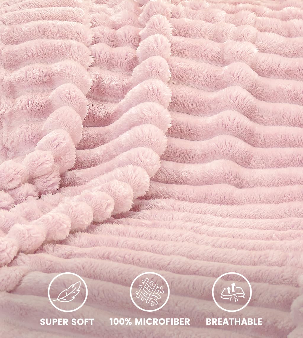 Utopia Bedding pink striped fleece blanket wrapped around shoulders for lightweight warmth