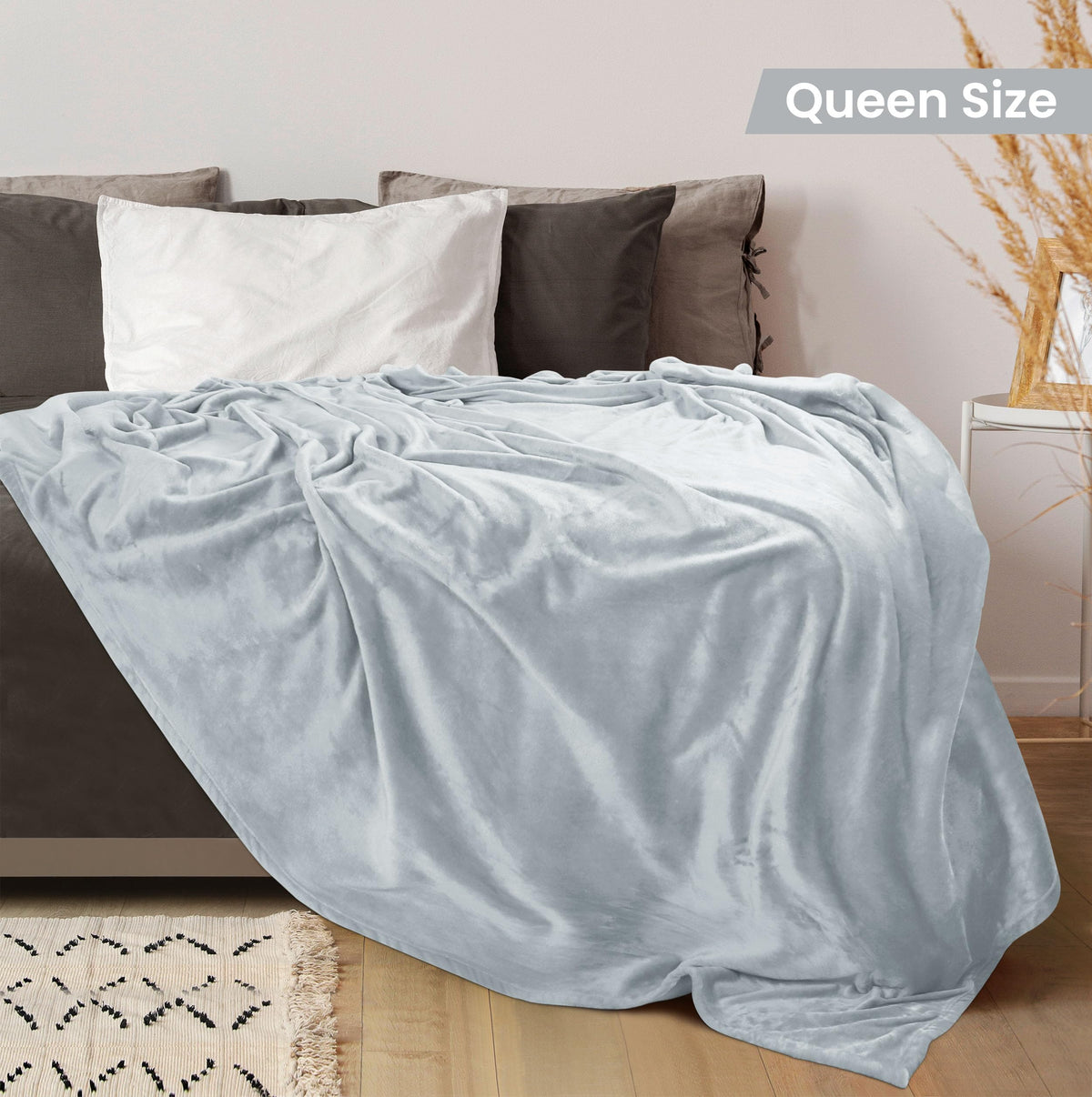 Utopia Bedding plush two sided pile draped over sofa for cozy home decor.
