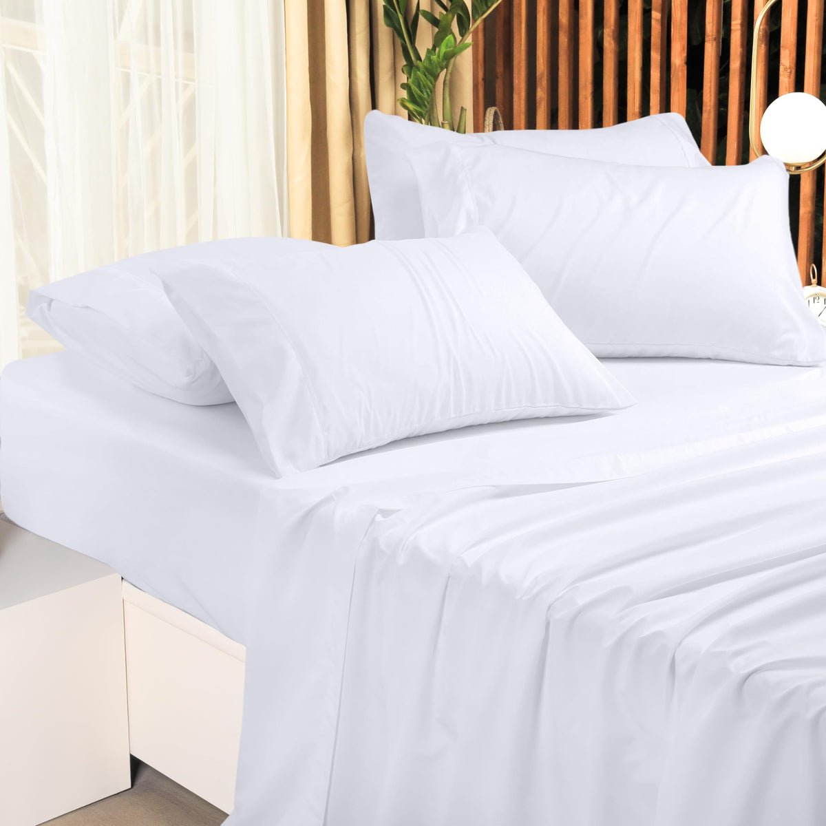 Utopia Bedding queen bed in white conveys spa-like cleanliness.