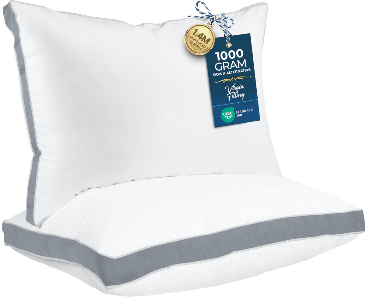 Utopia Bedding queen pillow set of 2 in grey resting plushly on a bed