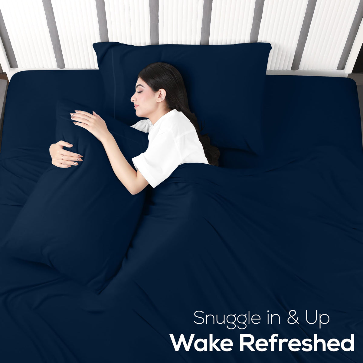 Utopia Bedding draped bed with navy jersey-knit sheets