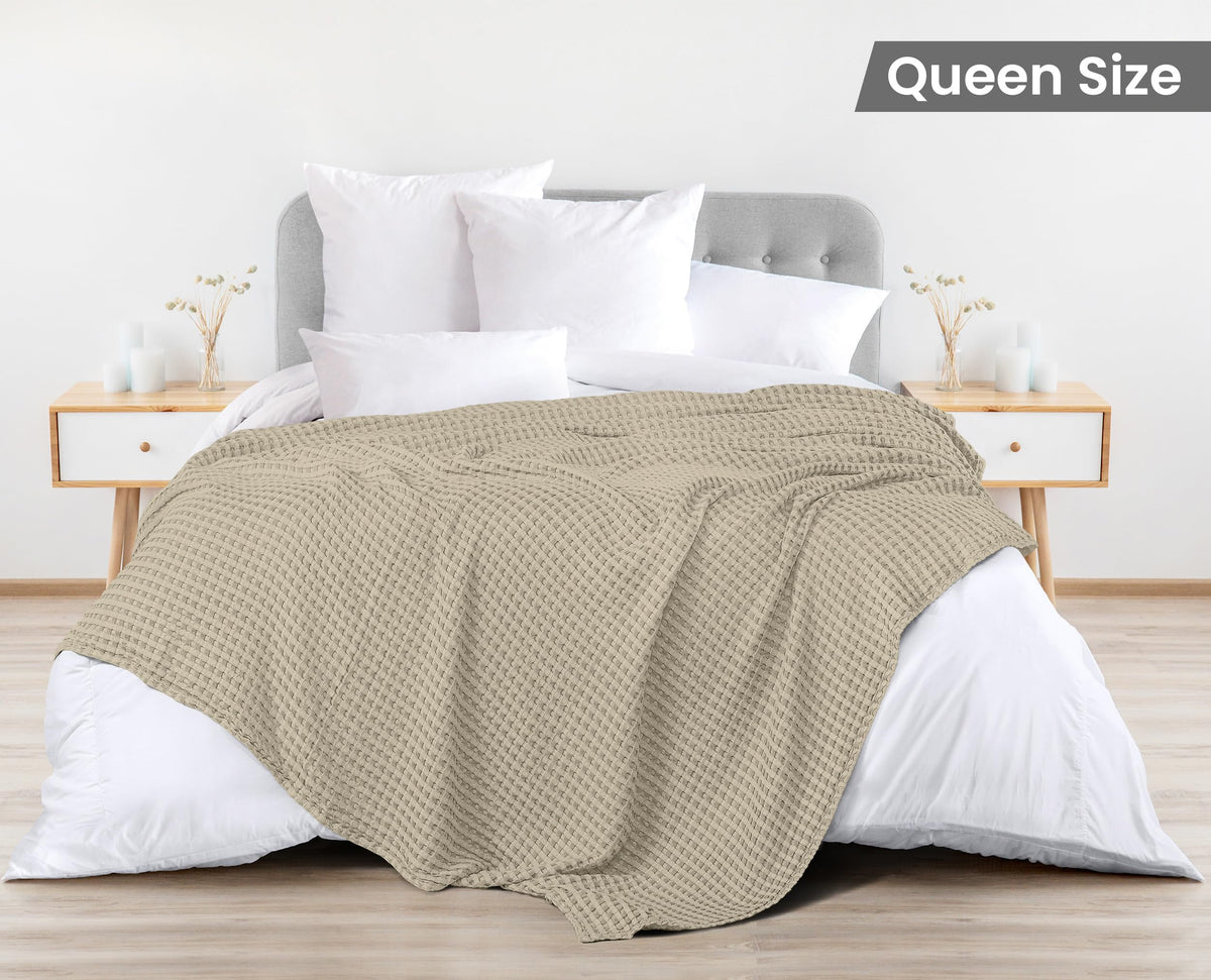 Utopia Bedding queen-size blanket draped on bed shows elegant all-season use.