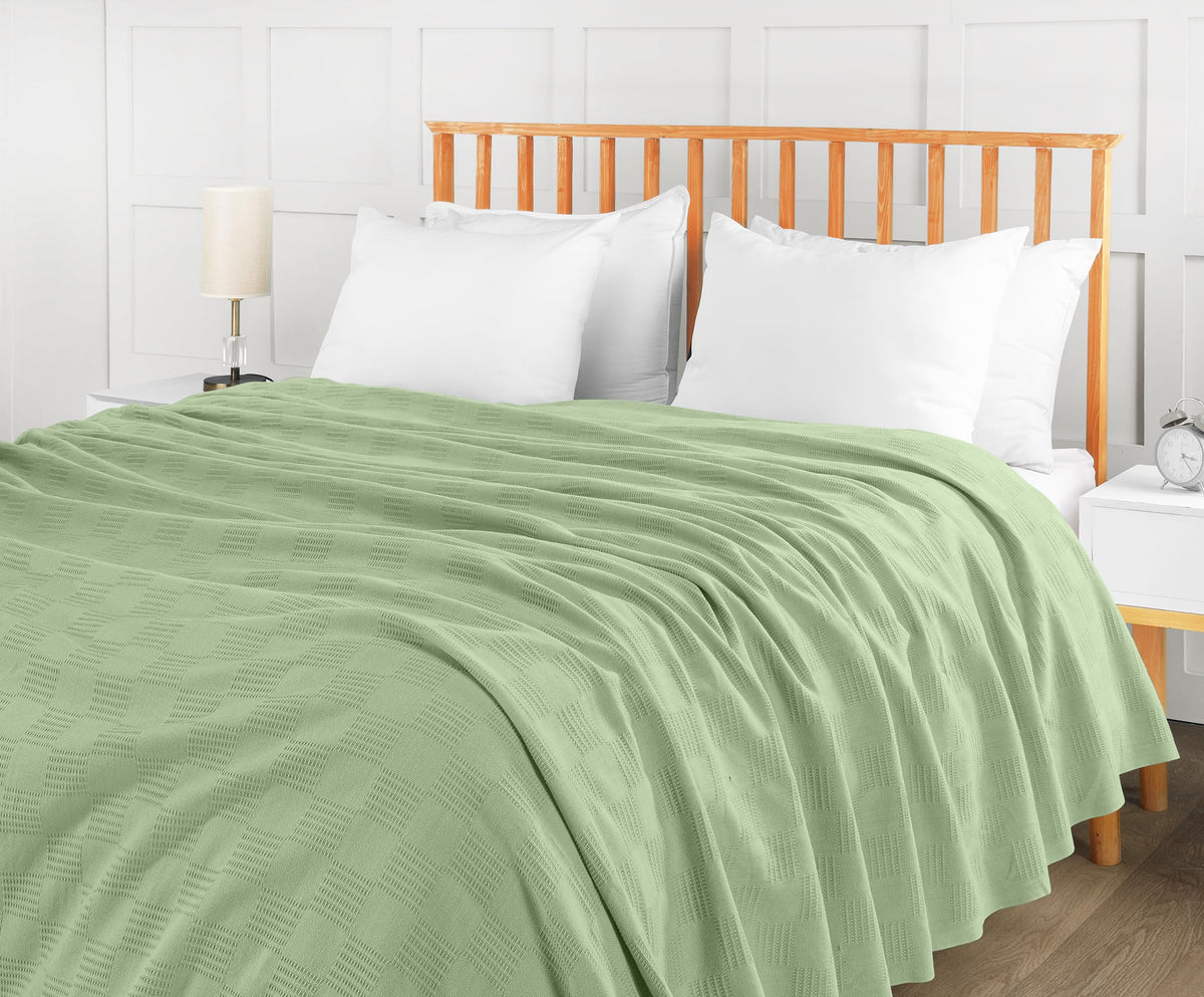 Queen-size cotton thermal blanket Sage Green from Utopia Bedding for neat storage.