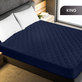 Utopia Bedding quilted fabric closeup reveals generous fiberfill loft for extra cushion.