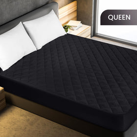 Elastic edge detail on Utopia Bedding mattress pad ensures snug fit on deep mattresses