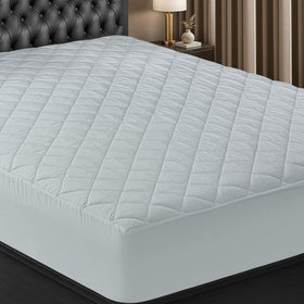 Utopia Bedding quilted fitted mattress pad twin in bed scene