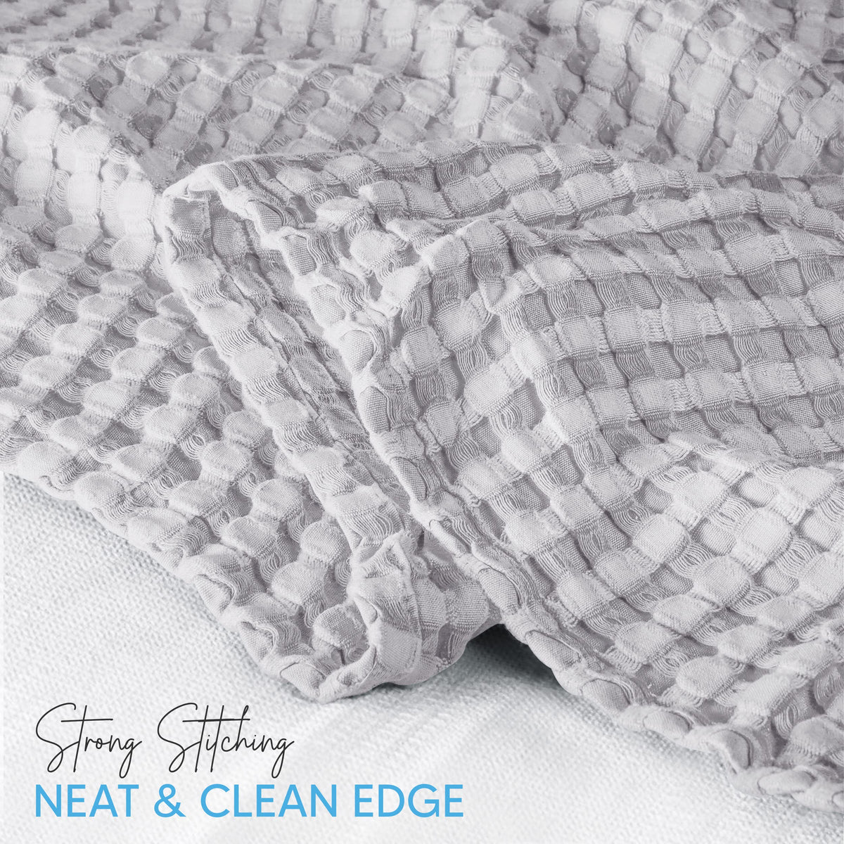 Ring spun edging detail on Utopia Bedding waffle blanket shows durable finish.