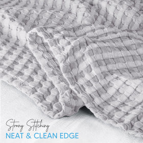 Ring spun edging detail on Utopia Bedding waffle blanket shows durable finish.