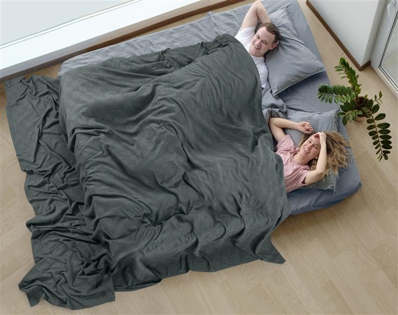 Utopia Bedding thermal blanket on a couch setting showcasing neutral smoke gray