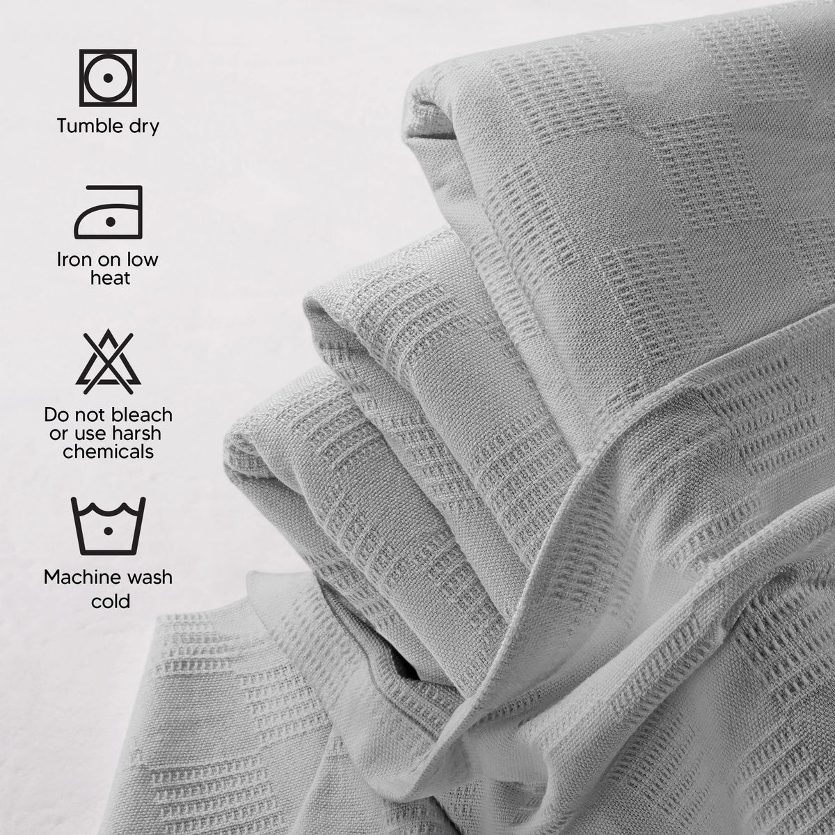 Utopia Bedding thermal blanket on sofa complements living room with versatile drape.