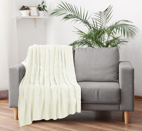 Utopia Bedding thermal blanket styled in a living room setup