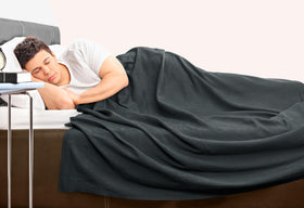 Utopia Bedding smoke gray blanket on living room chair complements modern decor