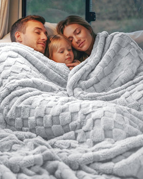 Travel-friendly blanket by Utopia Bedding folded compact for trips