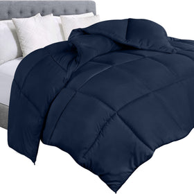Utopia Bedding twin comforter duvet insert in navy laid on a bed for full coverage.
