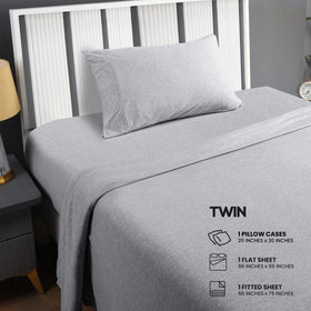 Utopia Bedding twin jersey-flat sheet laid flat beside a pillowcase for full coverage.