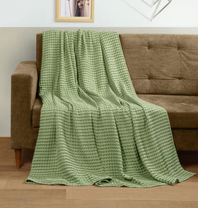 Utopia Bedding waffle blanket on couch offers soft warmth for evenings.