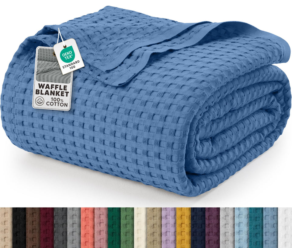 Utopia Bedding waffle-weave blanket on couch for breathable comfort.