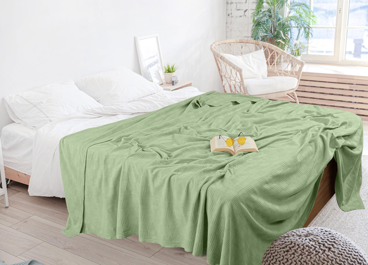 Year-round use Sage Green blanket by Utopia Bedding for versatile comfort.