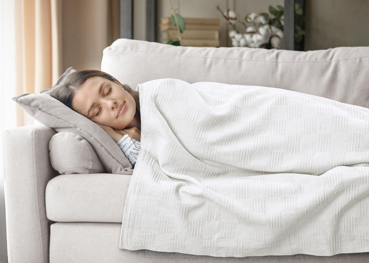 Utopia Bedding white cotton thermal blanket, ideal for living room decor.
