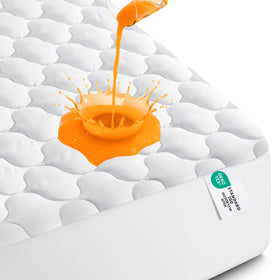Utopia Bedding waterproof mattress protector on king bed with secure fit and spill protection