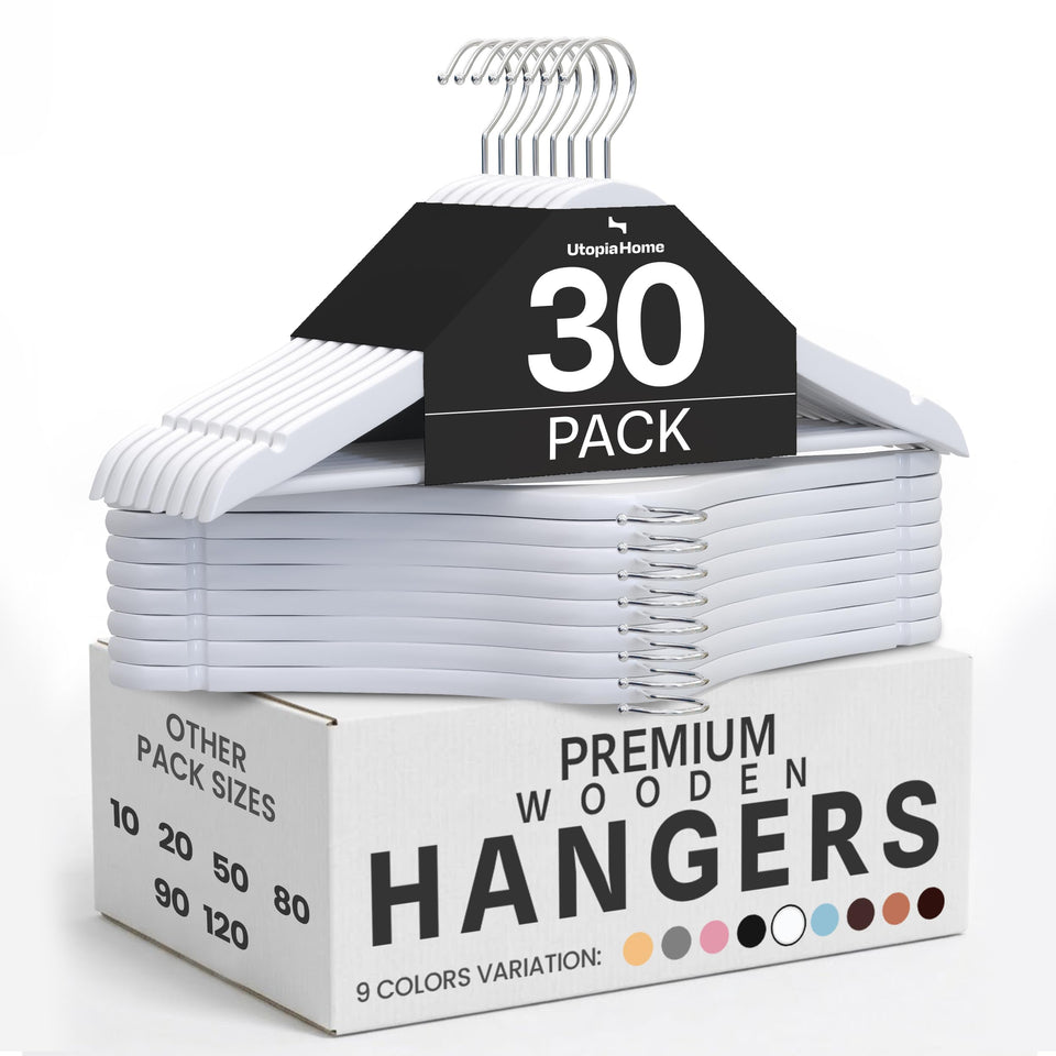 Utopia Home premium wooden hangers show a slim, organized closet.