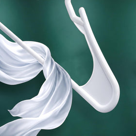 Utopia Home slim-profile hangers on closet rod, neat, evenly spaced wardrobe.