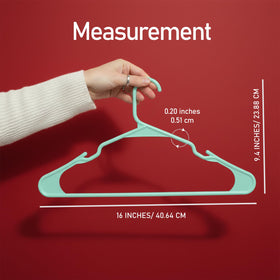 Utopia Home space-saving hangers maximize closet capacity on a single rod.