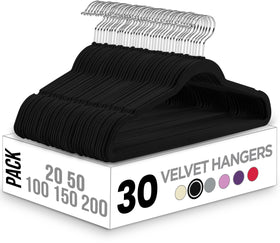 Utopia Home velvet hanger with pants bar keeps suits neat and accessible.