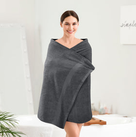 Utopia Towels 4-Pack bathroom towels hanging neatly in a modern space.